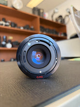 Load image into Gallery viewer, Soligor 80–200mm f/4.5 Telephoto Zoom Lens (Canon FD Mount — AE-1 Compatible) — Excellent Condition