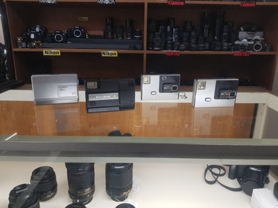 4 Used Disc Cameras