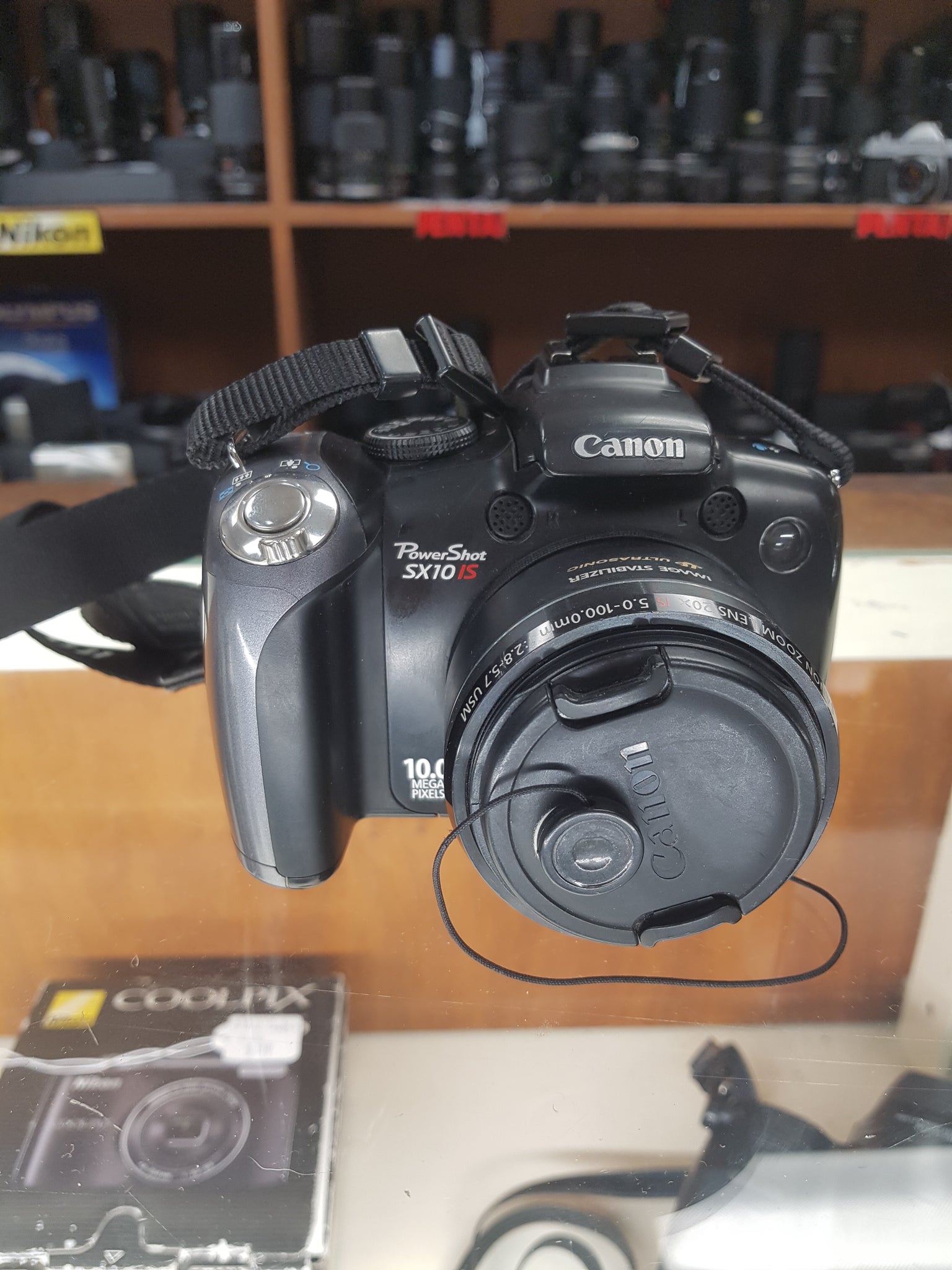 Canon PowerShot SX10 IS - Câmera versus Câmera - Reviews, Comparativos Canon PowerShot SX10 IS - Câmera versus Câmera - Reviews, Comparativos