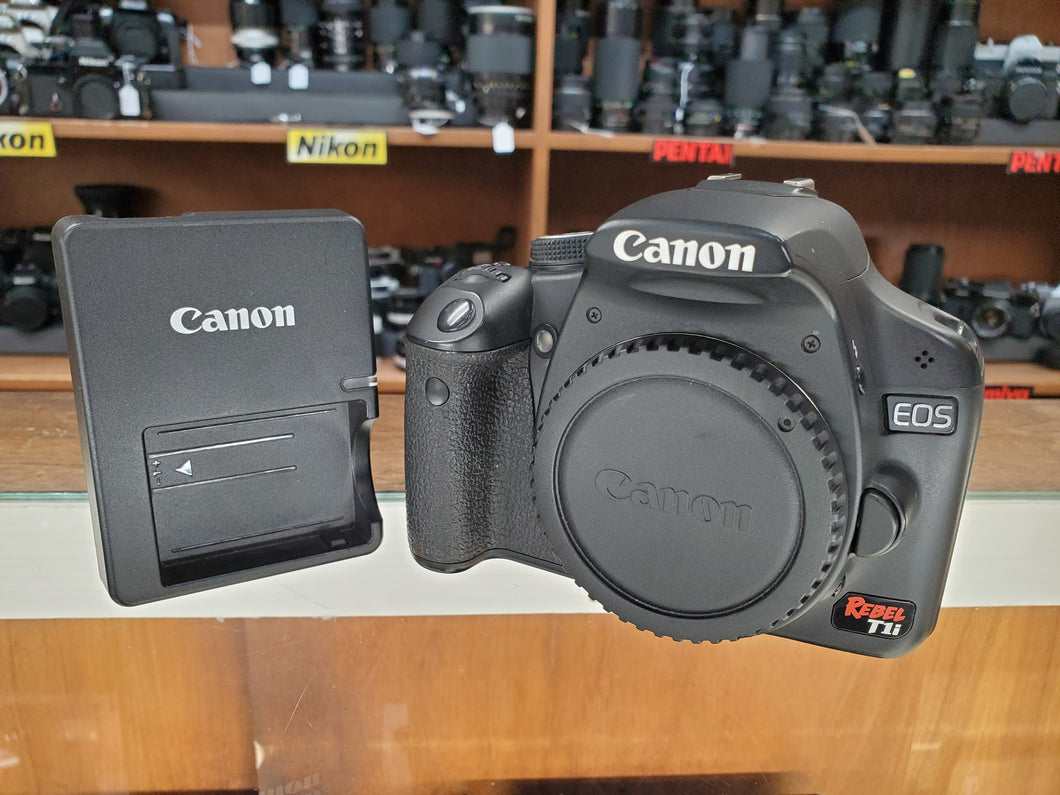 Canon Rebel T1i - 15.1MP 1080p DSLR, battery, charger, Excellent Condition - Paramount Camera & Repair
