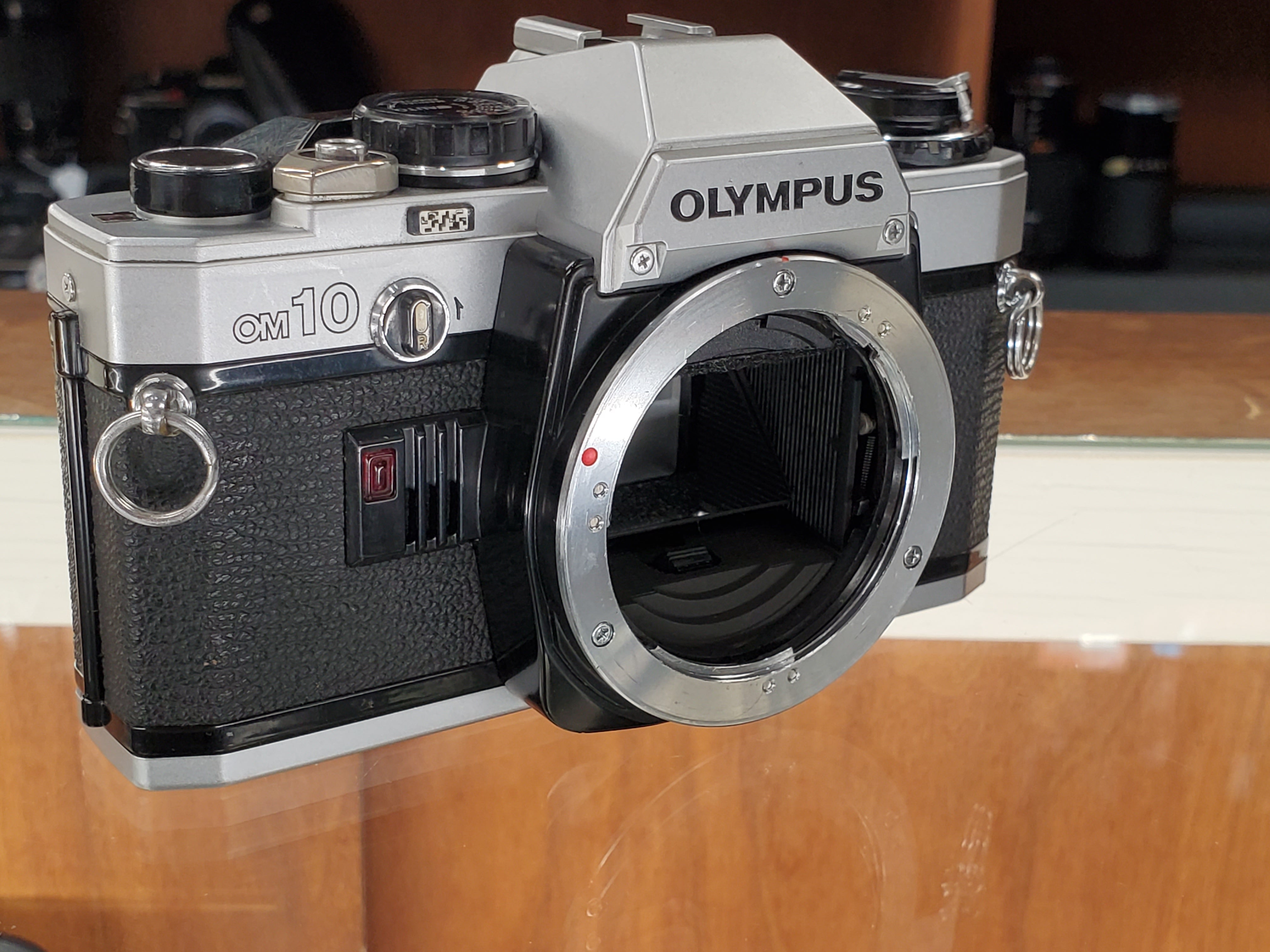 Olympus OM10 SLR 35mm film camera, Professional CLA, New Mirror Foam - Paramount Camera & Repair