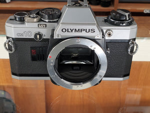 Olympus OM10 SLR 35mm film camera, Professional CLA, New Mirror Foam - Paramount Camera & Repair